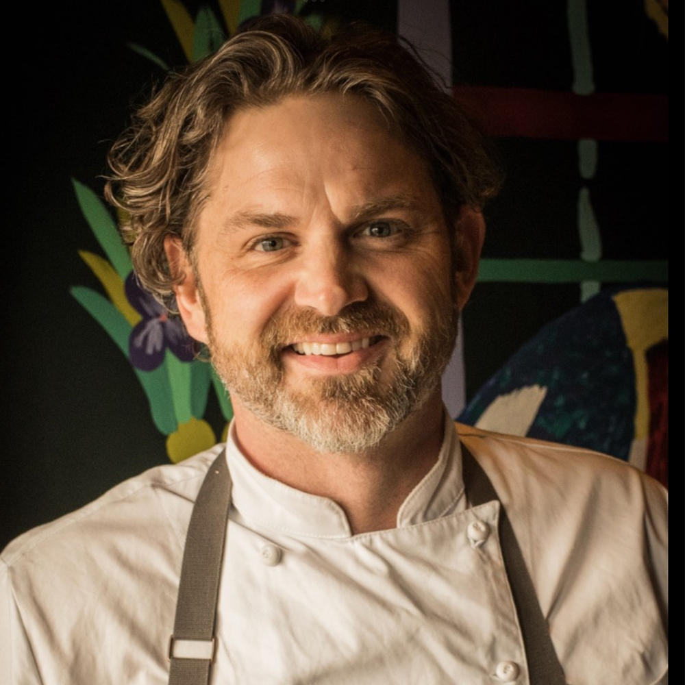 Chef Kelly English smiling for the camera